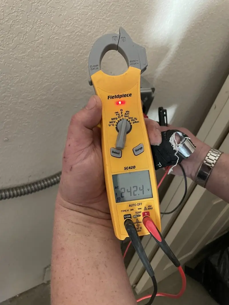 Voltage testing with clamp meter during Generator Installation in Greenbriar